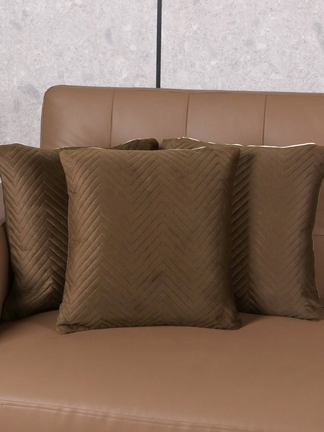 

Saral Home Brown 3 Pieces Geometric Velvet Square Cushion Covers