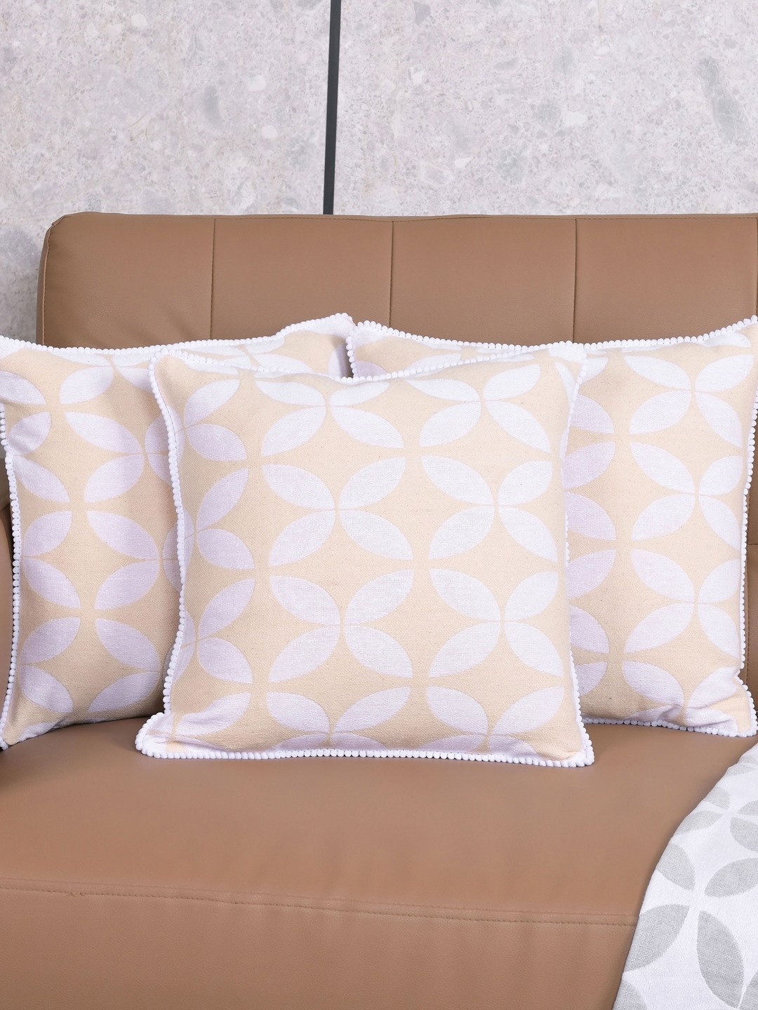 

Saral Home White & Beige 3 Pieces Geometric Dhadki Cotton Square Cushion Covers