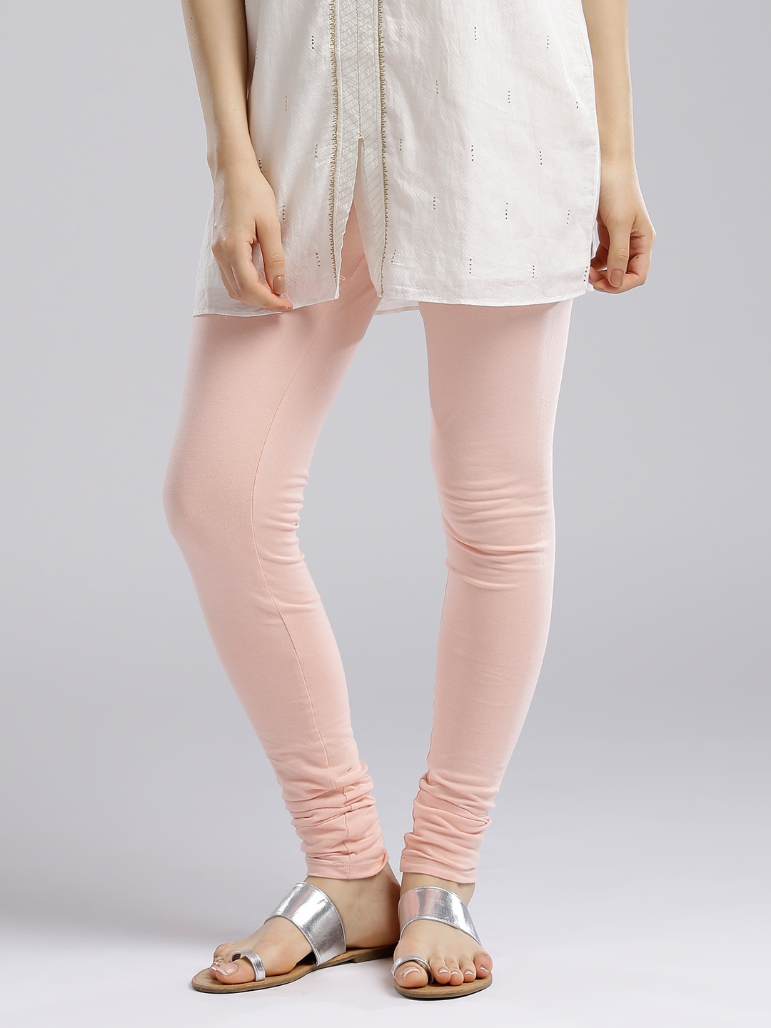 

W Women Peach-Coloured Solid Churidar Leggings