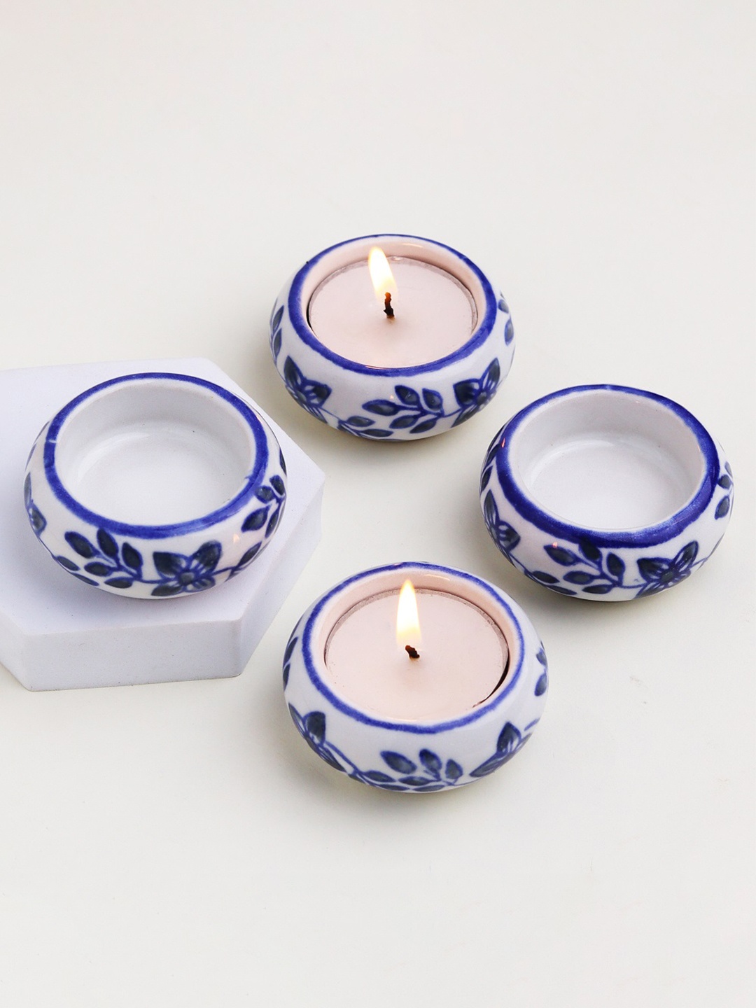 

Indianshelf Blue & White 4 Pieces Printed Ceramic Candle Holders