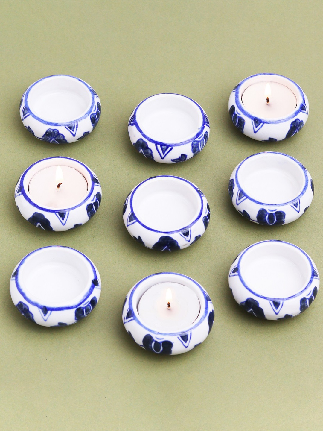 

Indianshelf Blue & White 9 Pieces Printed Ceramic Candle Holders