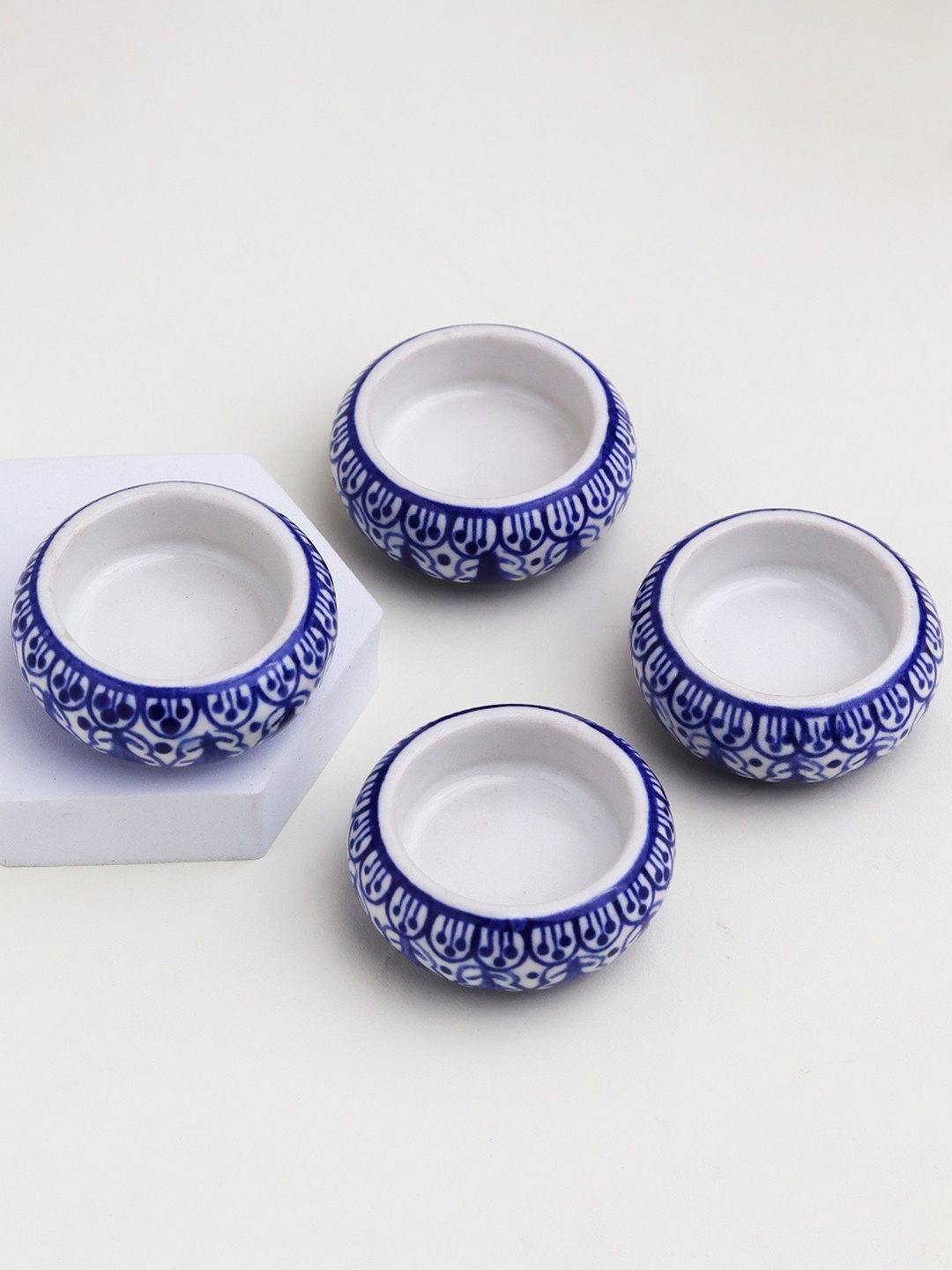 

Indianshelf Cream-Coloured & Blue Ceramic Candle Holder
