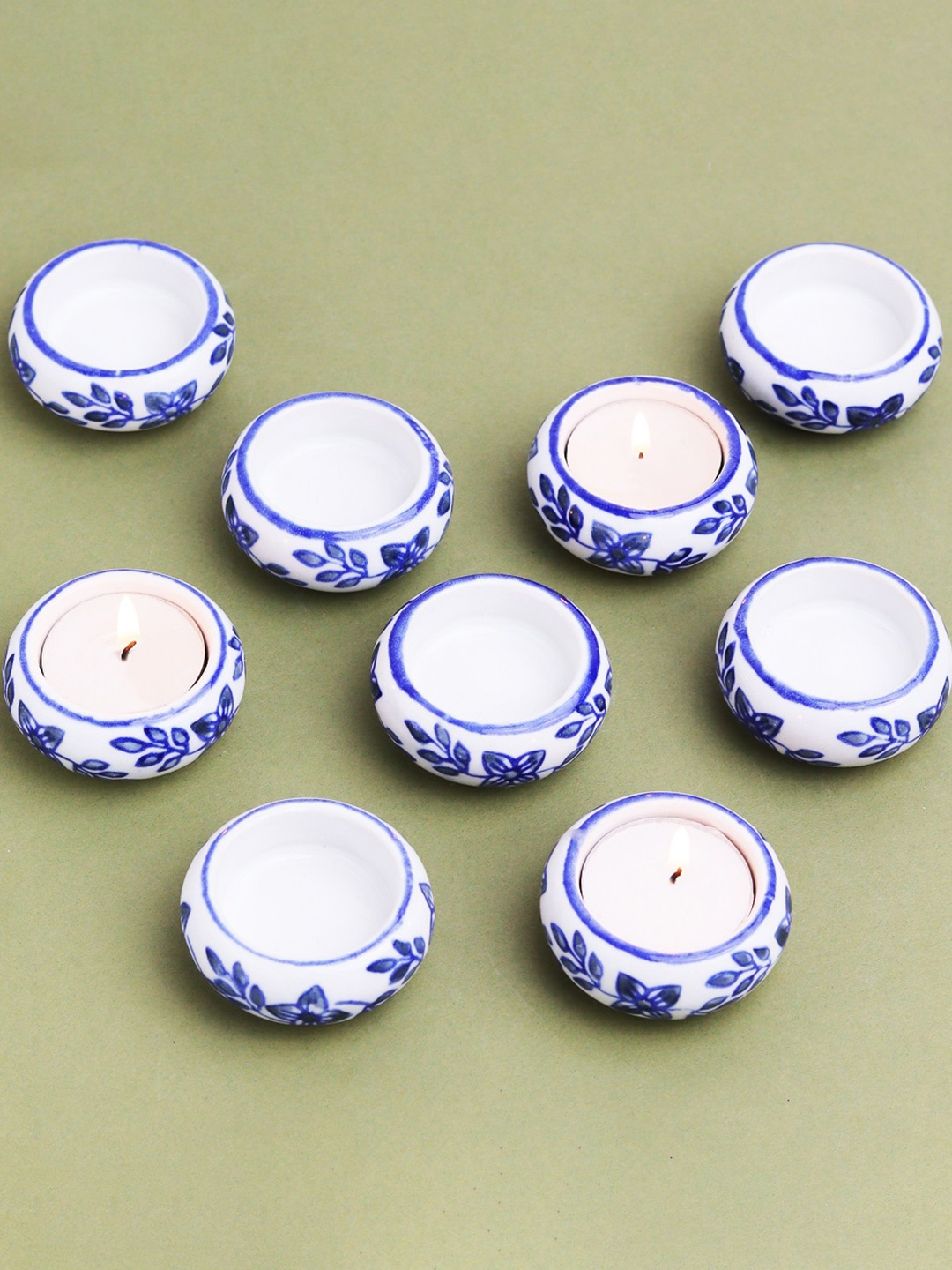 

Indianshelf Blue & Cream-Coloured 9 Pieces Ceramic Candle Holder