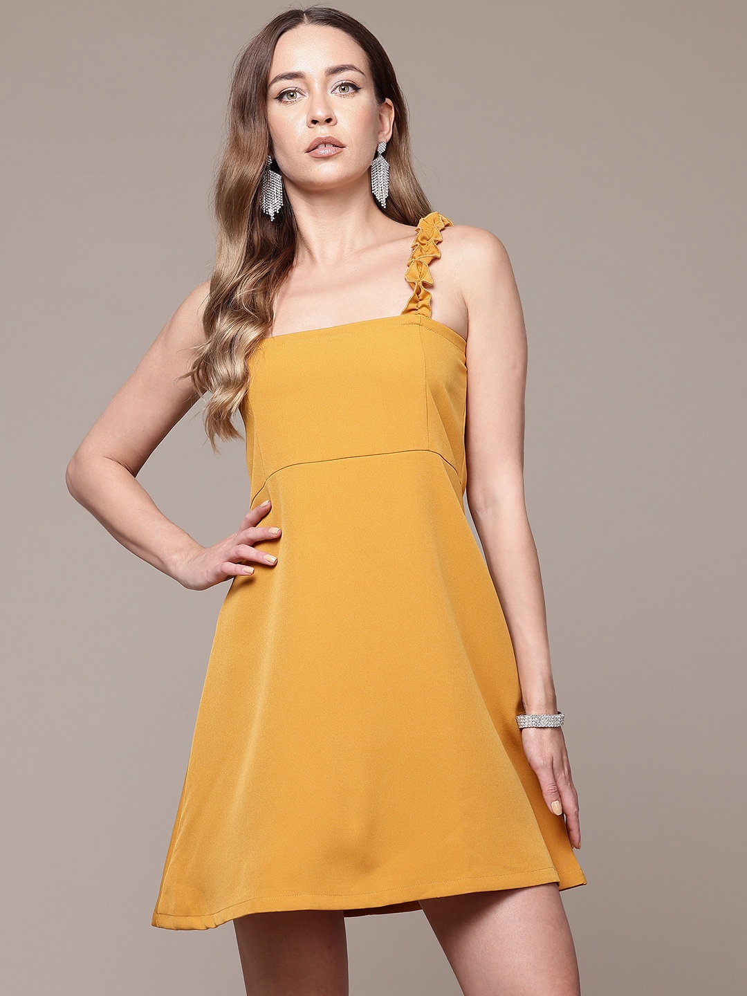 

bebe Ruffles Shoulder Straps A-line Mini Dress with Ruffled Detail, Mustard