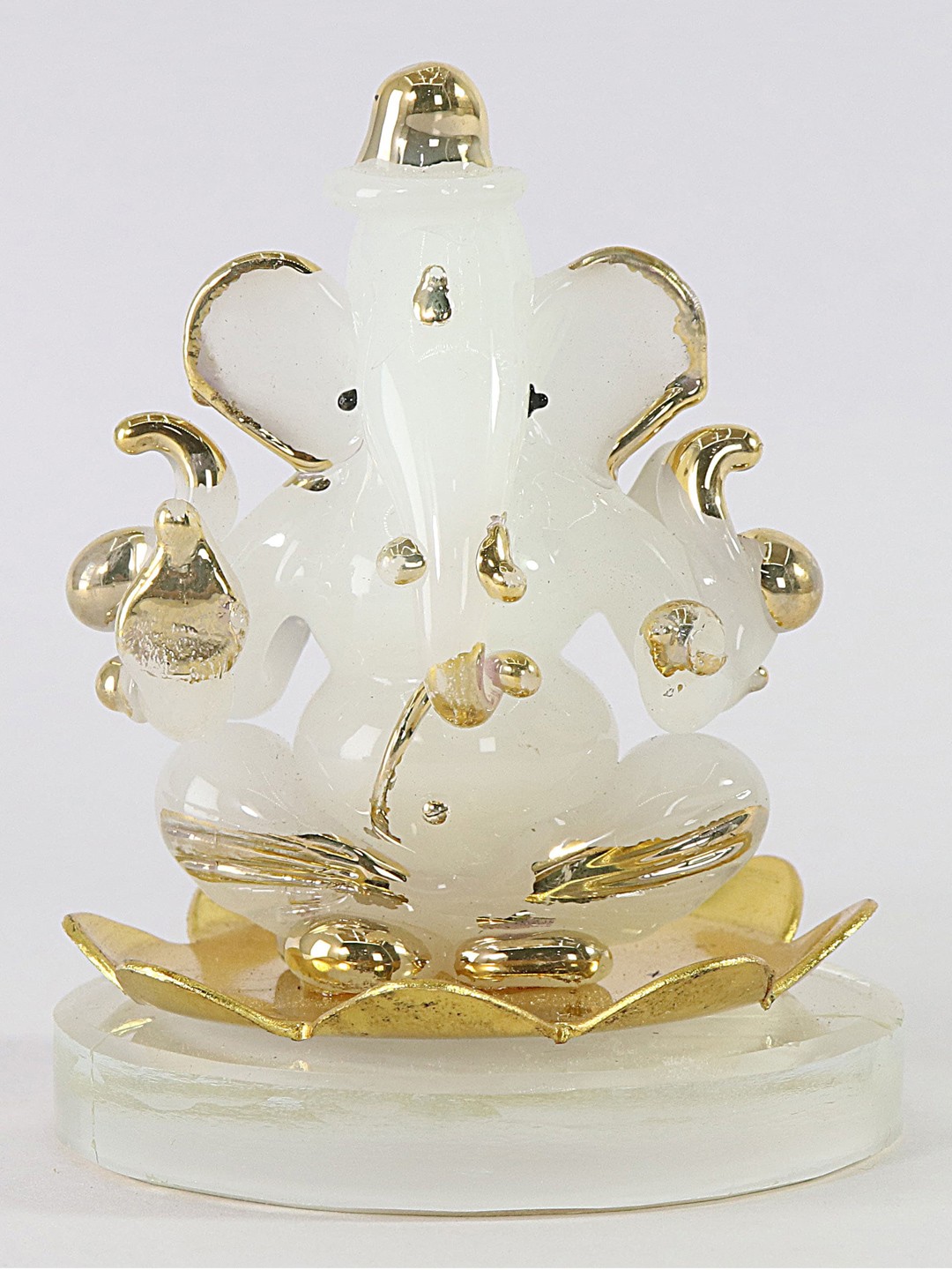 

NMII White & Gold Toned Ganesh Ji on Lotus Religious Idol Showpiece