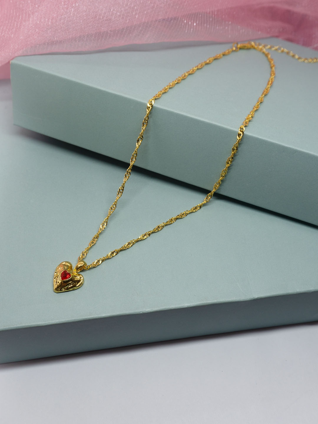 

Niscka Gold-Plated Heart Shaped Stone Studded Pendant With Chain