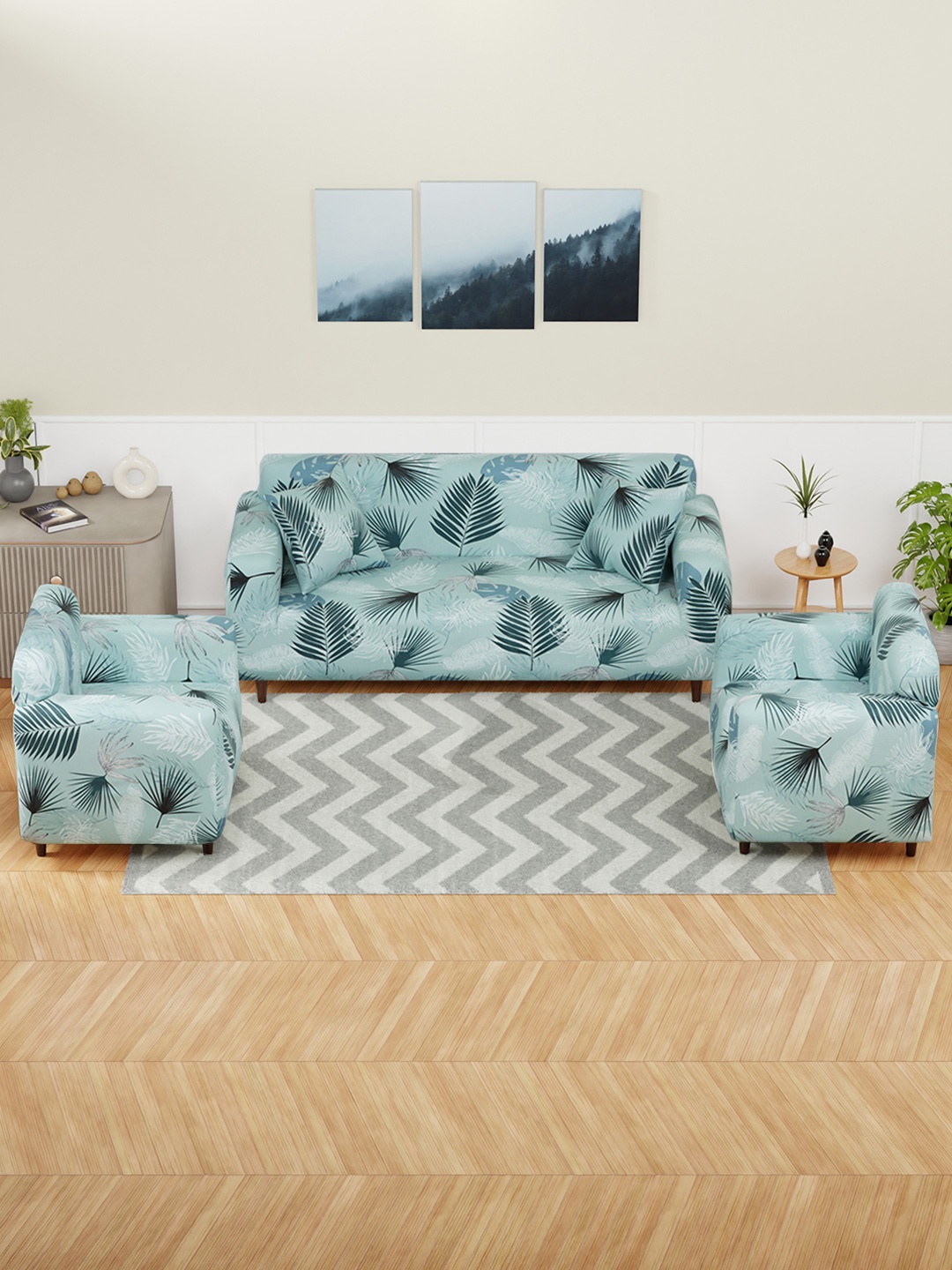 

Aura Blue & White 3 Pieces Leaves Printed 5 Seater Sofa Cover With Arms & Cushion Cover
