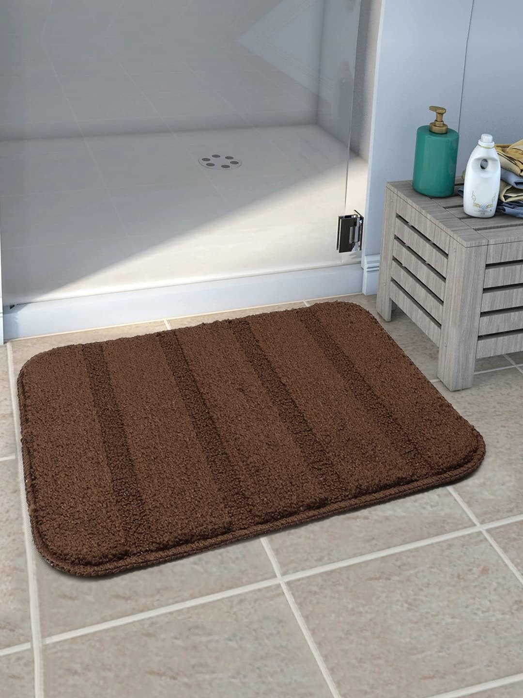 

Saral Home Brown 2 Pieces Striped Microfibre Rectangular Bath Rugs