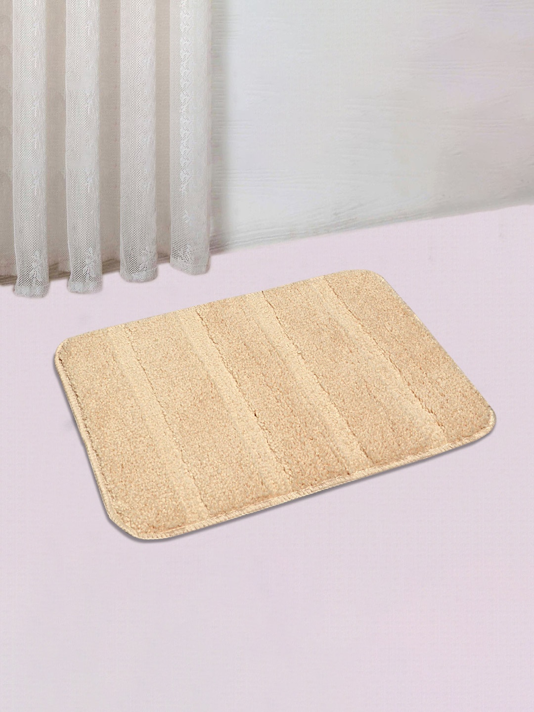 

Saral Home Beige 2 Pieces Striped Microfibre Rectangular Bath Rugs