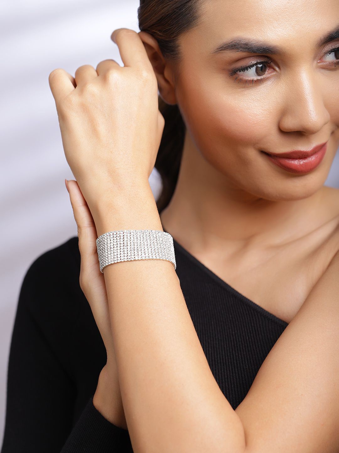 

Rubans Silver-Plated Sparkling Cubic Zirconia Studded Wide Bracelet for Elegant Styling