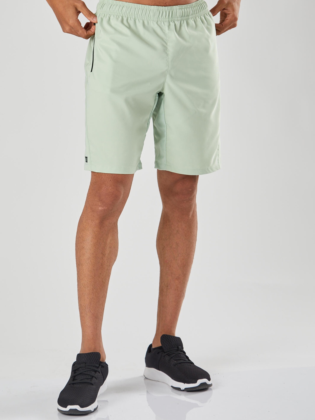 

Domyos By Decathlon Men Solid Mid-Rise Regular Shorts, Green