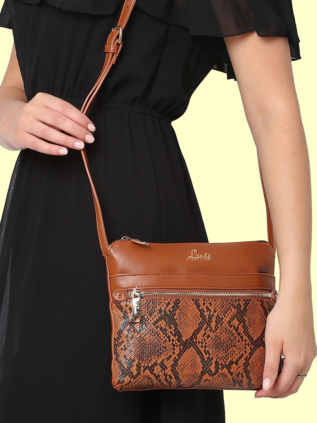 

Lavie Animal Printed Structured Sling Bag with Cut Work, Tan