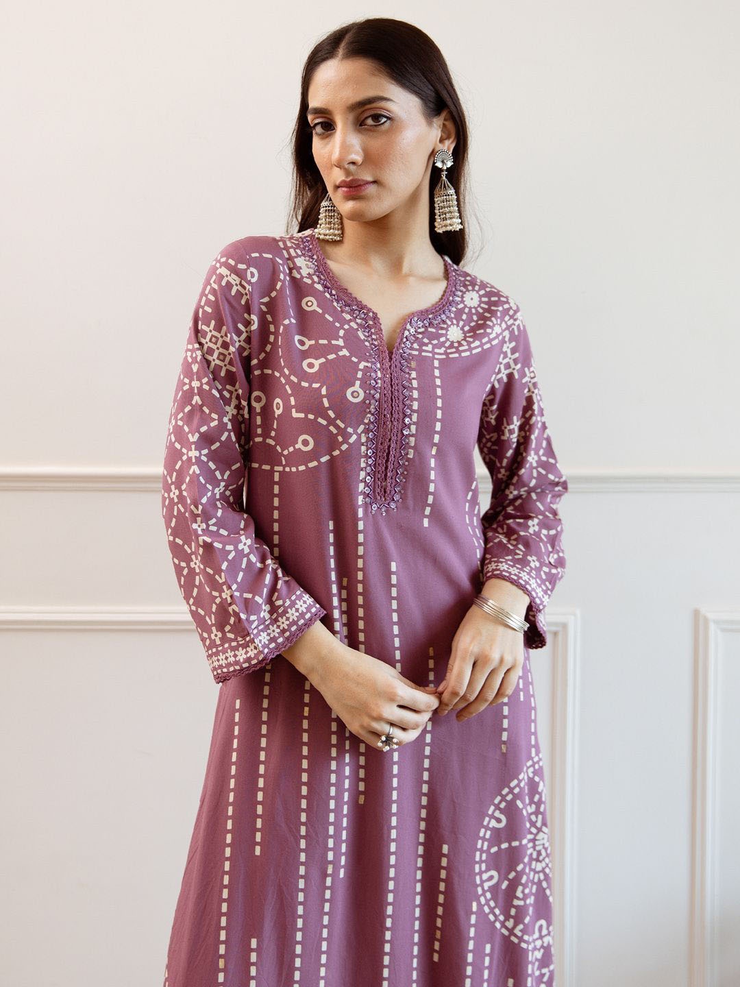 

Indo Era Women Printed Regular Beads and Stones Kurta with Trousers, Mauve