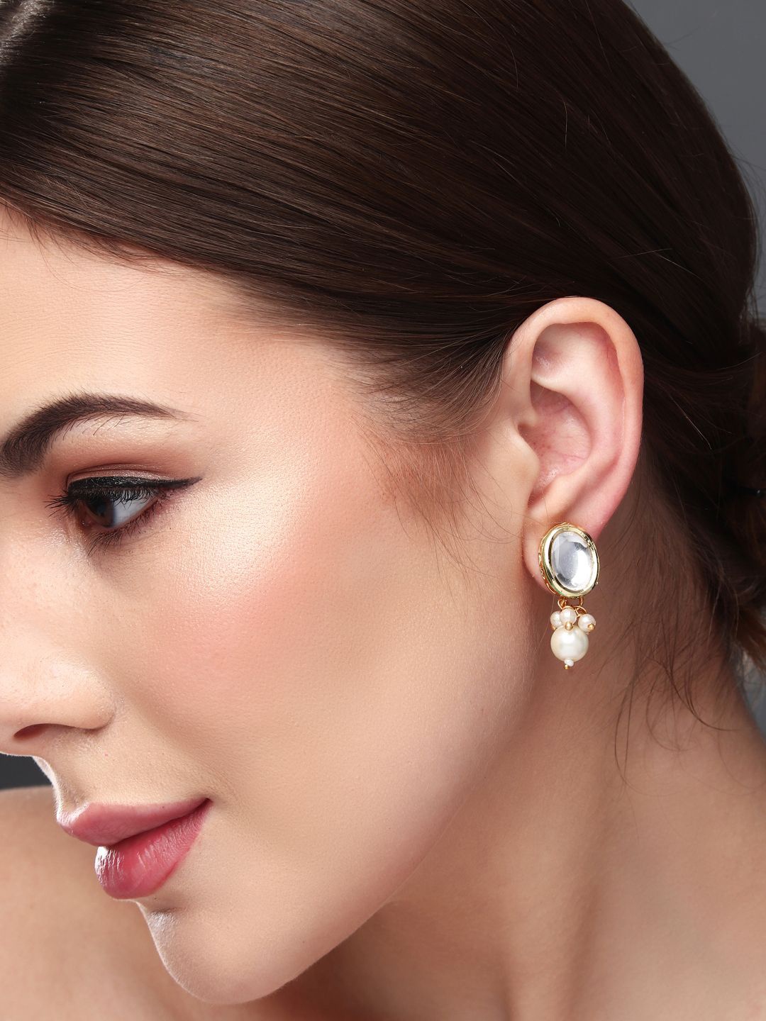 

Anvik Gold Plated Kundan Studded Contemporary Drop Earrings