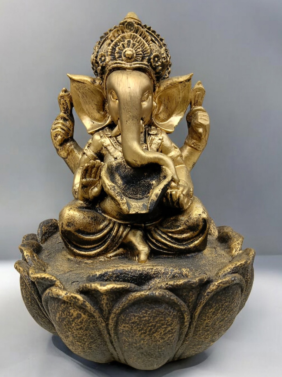

SANKALAN CREATIONS Copper-Toned Religious Ganesha Idol Indoor Fountain Showpiece