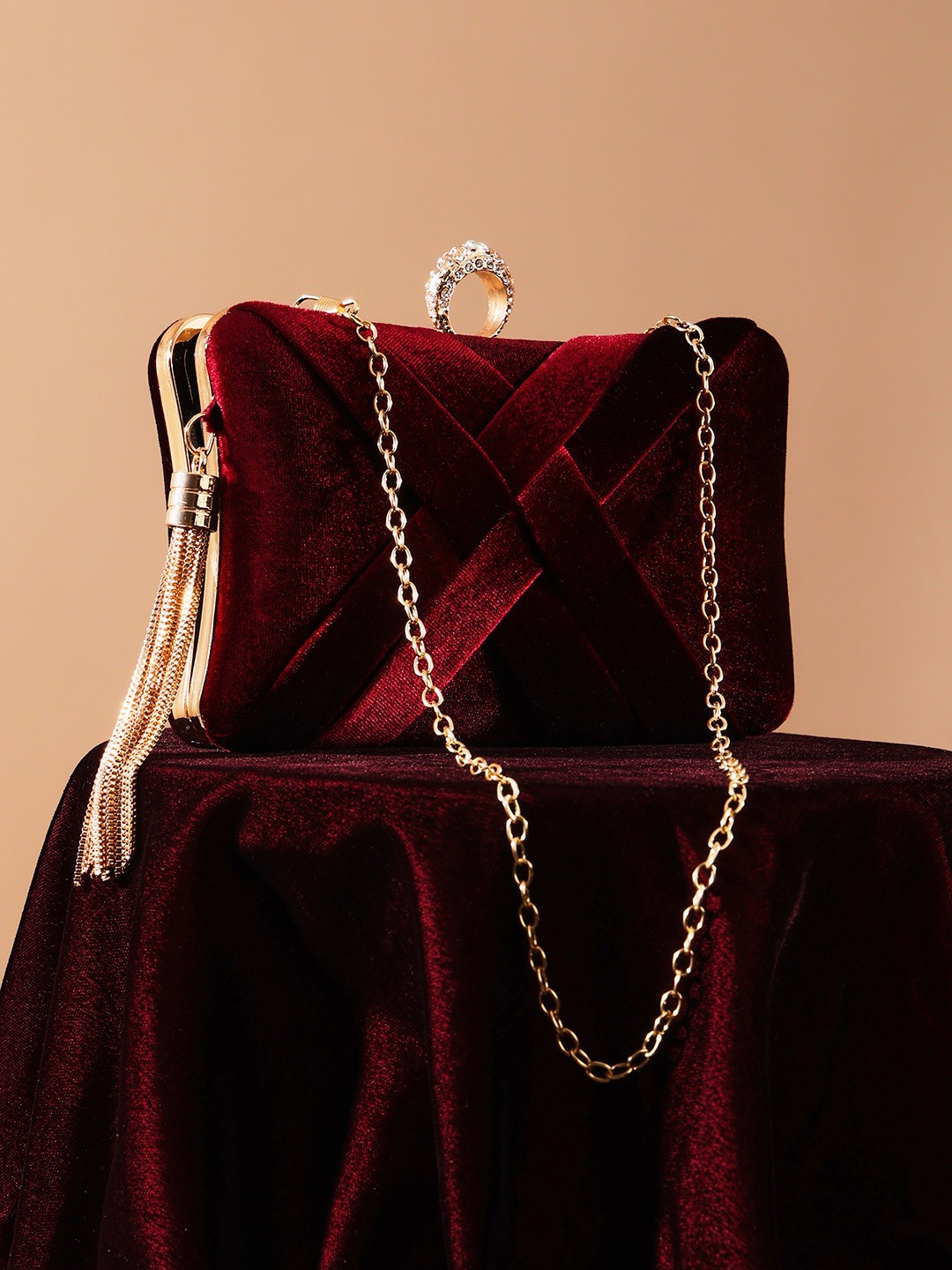 

Globus Women Ribbon Design Rectangular Clutch With Detachable Chain Strap & Tassel Charm, Burgundy