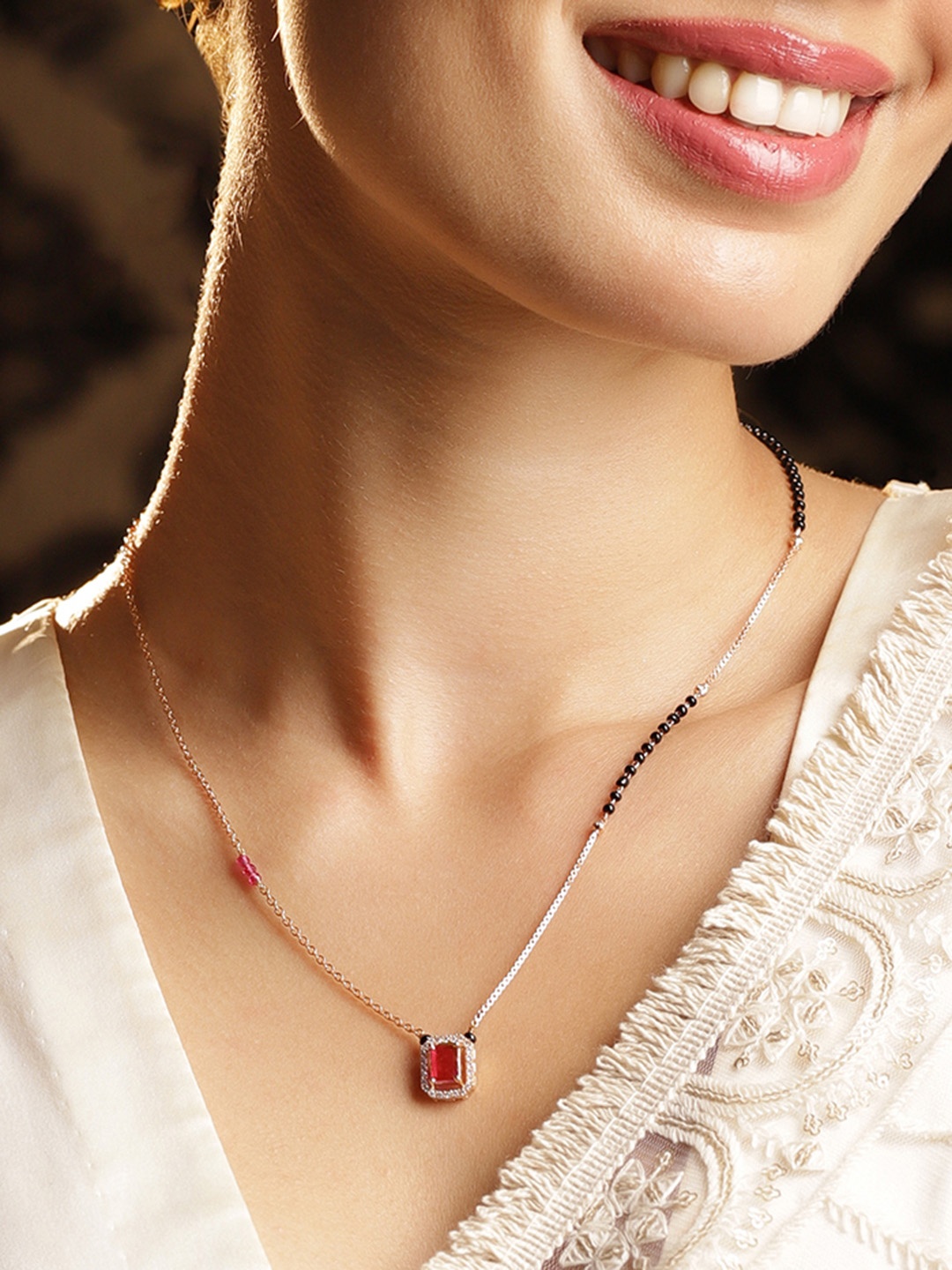 

Rubans 18K Gold-Plated Ruby & Cubic Zirconia Studded Black and Gold Beaded Mangalsutra