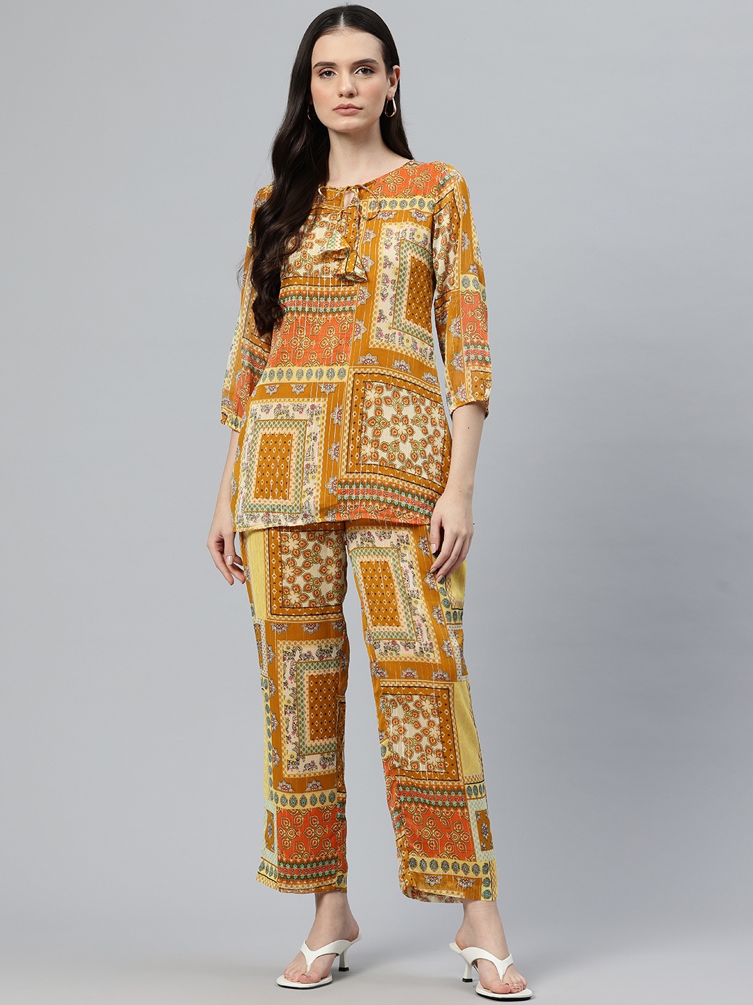 

Cottinfab Women Printed Tie-Up Neck Top with Trousers, Mustard