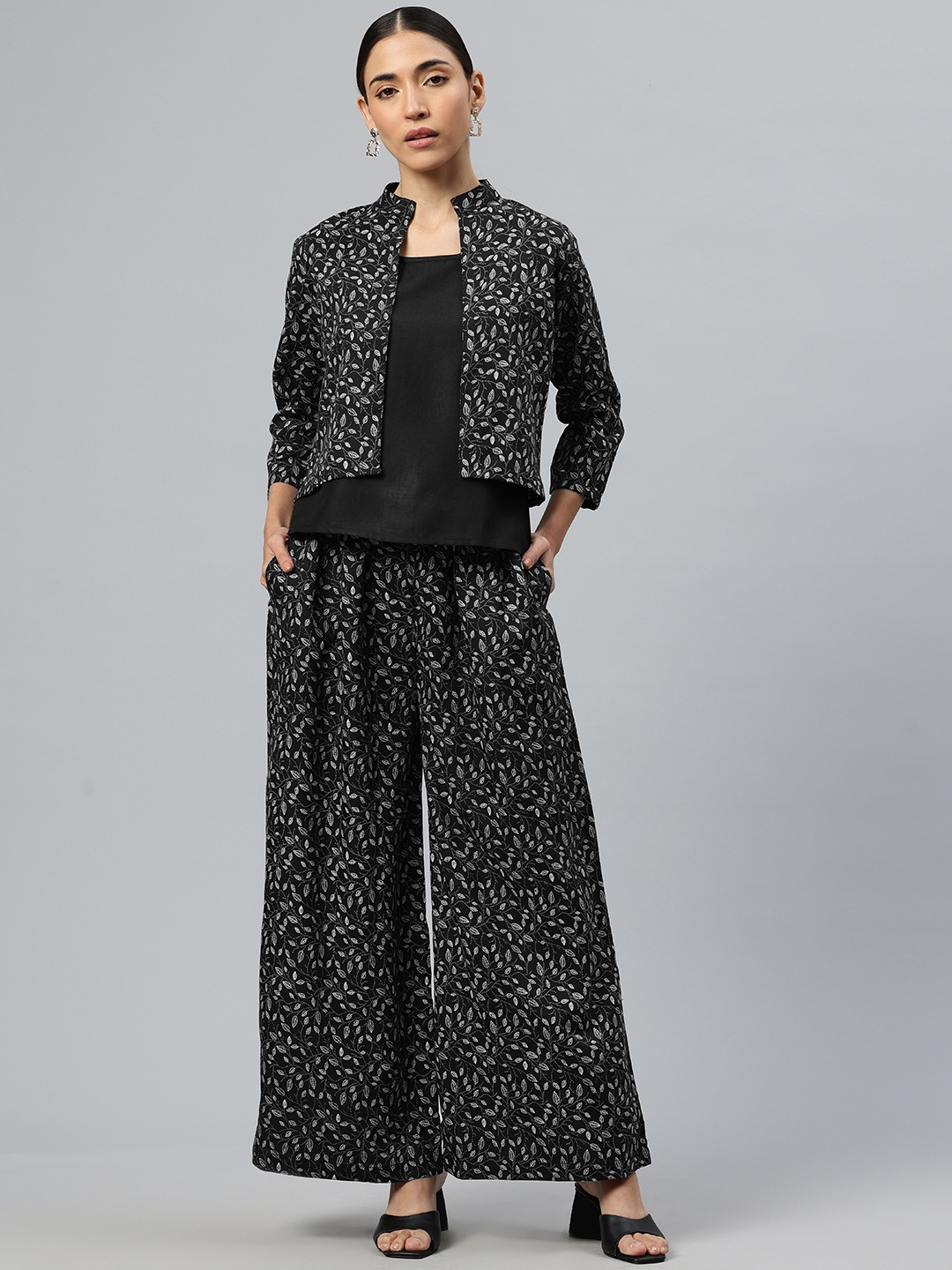 

Cottinfab Women Solid Black Top with Floral Printed Trousers & Jacket