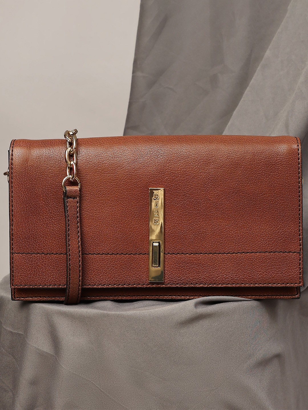 

RI2K LONDON Women Textured Leather Sling Bag, Brown