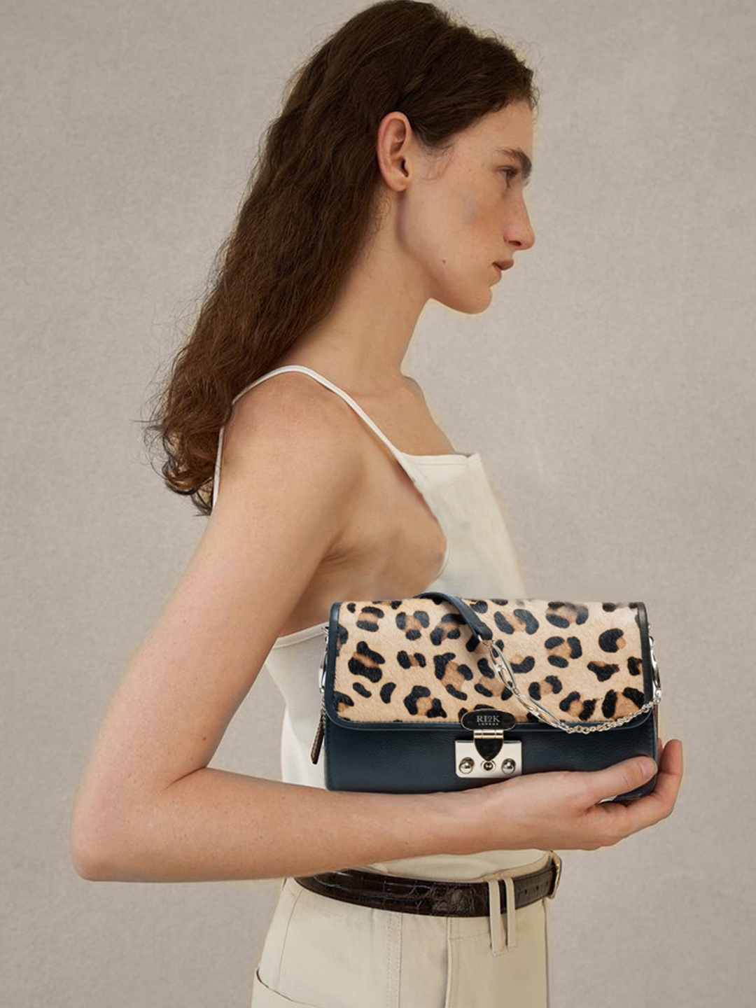 

RI2K LONDON Animal Printed Leather Structured Sling Bag, Black