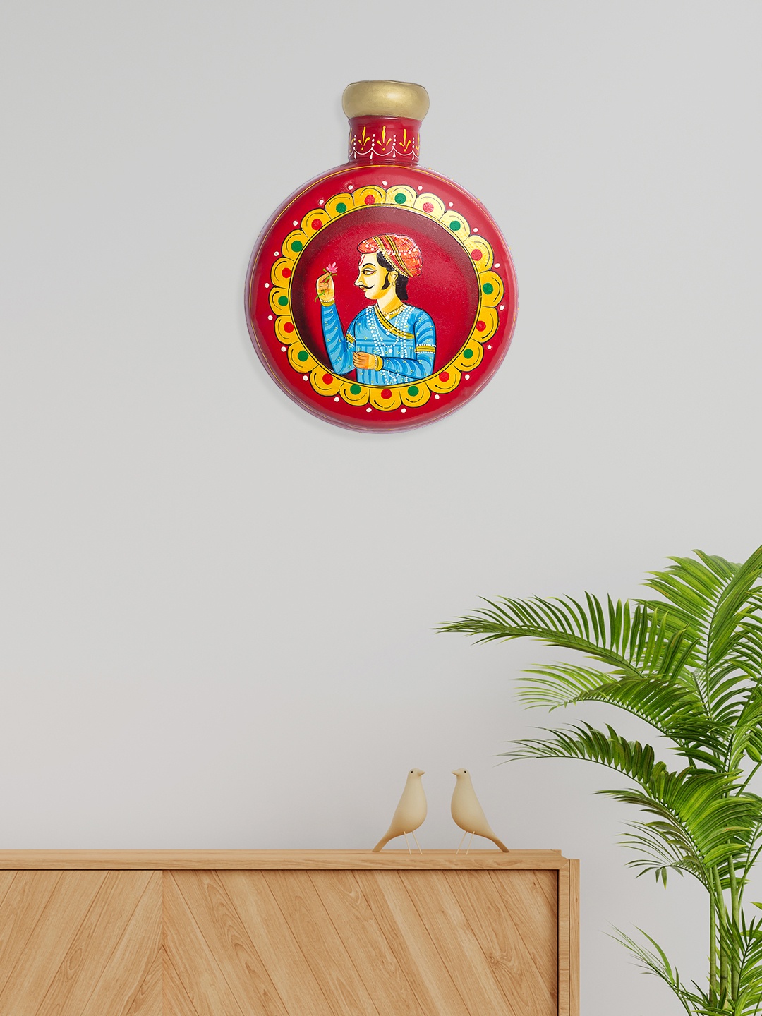 

Golden Peacock Red & Blue Akbar Printed Matka Shaped Wall Hangings