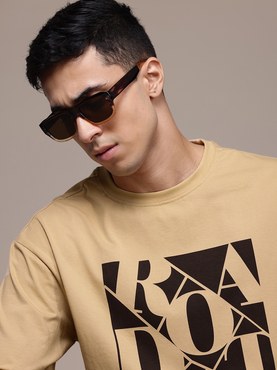 

The Roadster Lifestyle Co. Typography Print Drop-Shoulder Sleeves Pure Cotton T-shirt, Beige
