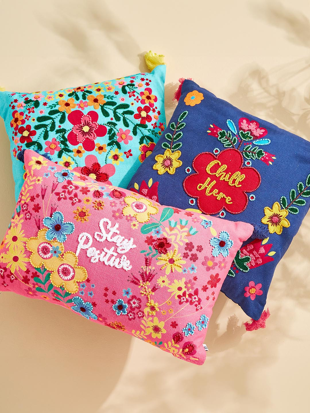 

Home Centre Pink & Yellow Floral Printed Beaded Cotton Filled Rectangle Cushion