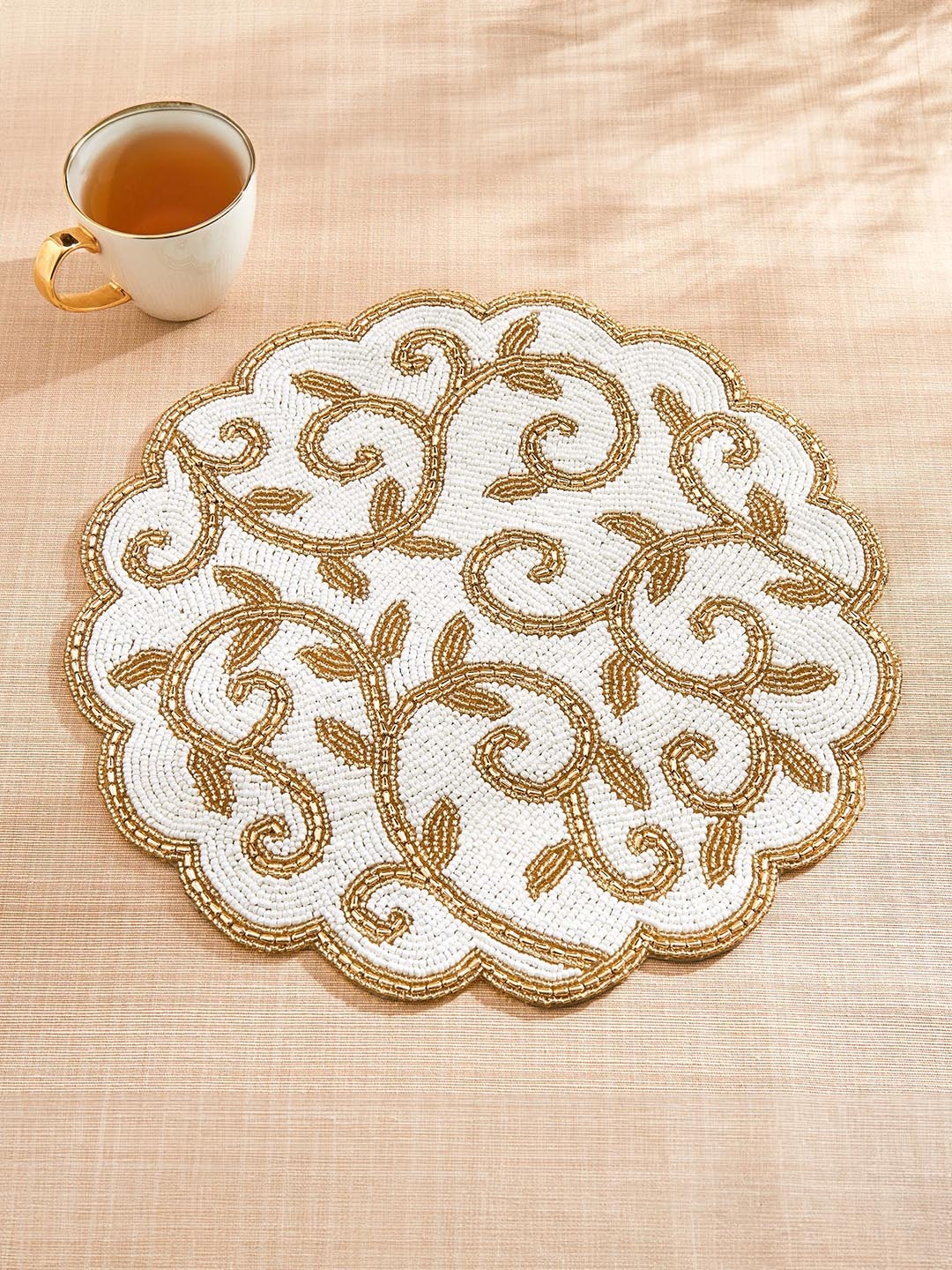 

Home Centre Halcyon White and GoldToned Beaded Glass Flower Table Placemats