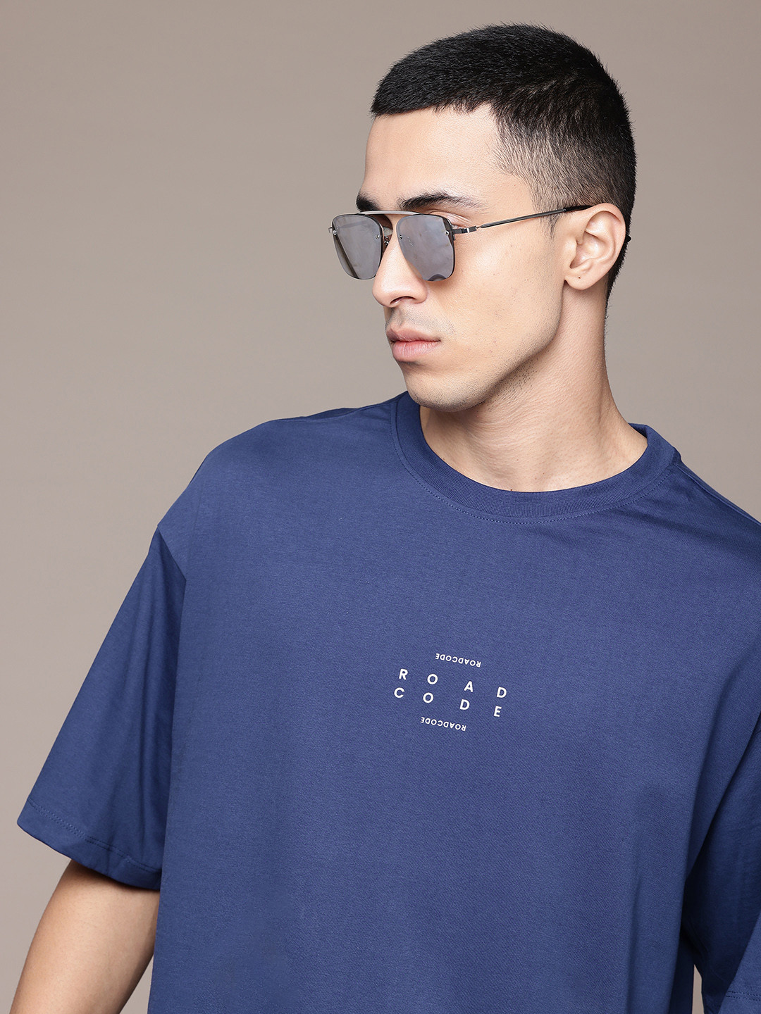 

The Roadster Lifestyle Co. Typography Print Detail Drop-Shoulder Sleeves Cotton T-shirt, Navy blue