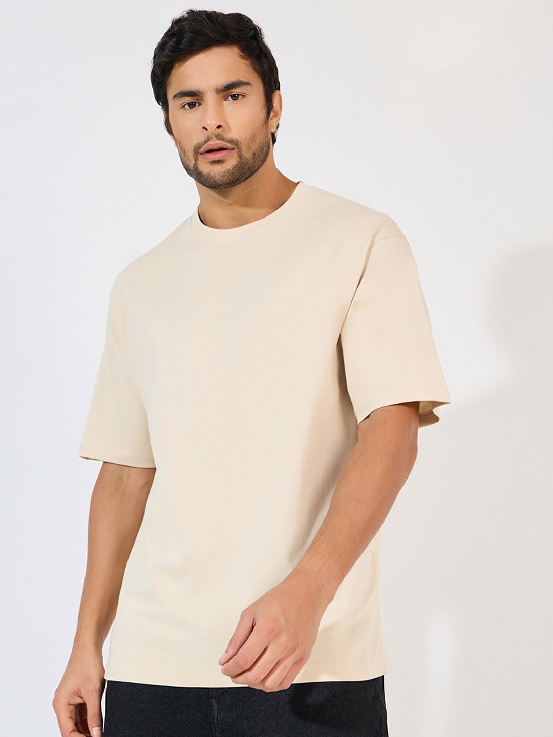 

Styli Men Solid Round Neck Cotton Oversized T-shirt, Cream