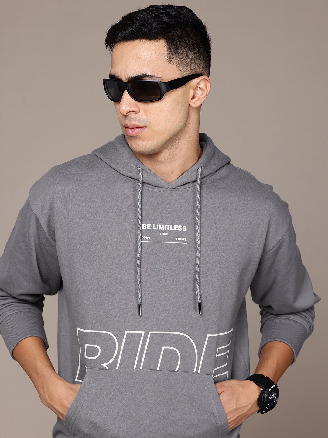 

The Roadster Lifestyle Co. Men Printed Hooded Sweatshirt, Grey