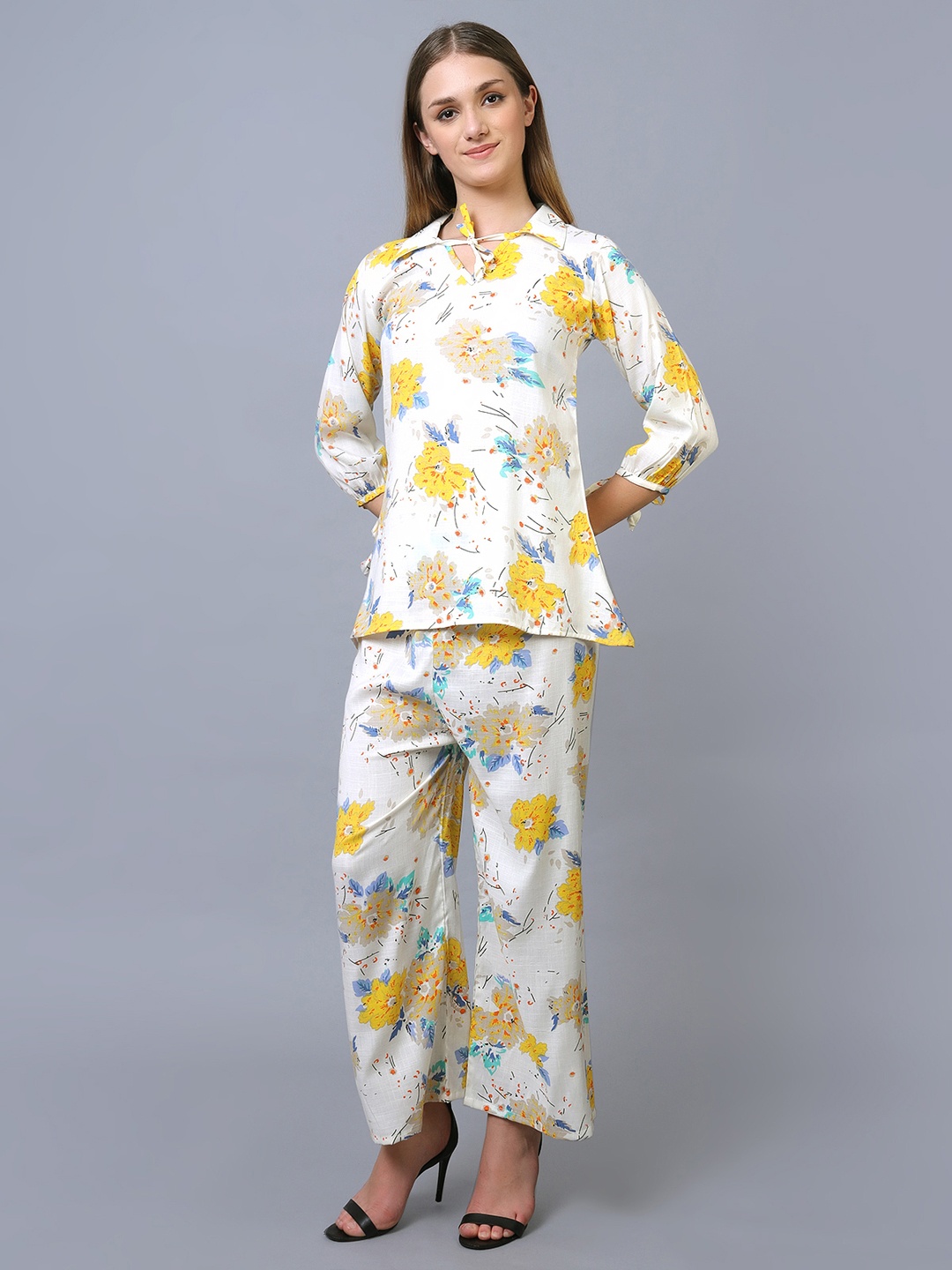 

Xivir Women Printed Tunic And Trousers Set, Yellow