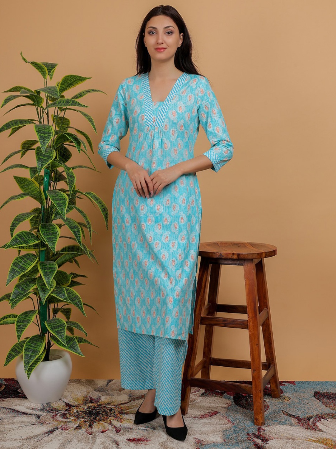 

Anikrriti Sanganeri Floral Printed V-Neck Pure Cotton Straight Kurta with Palazzos, Turquoise blue