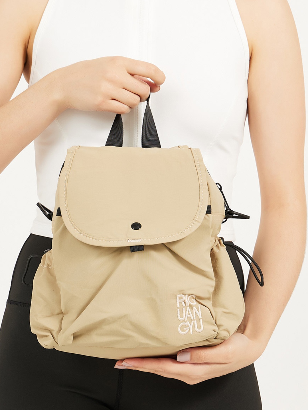 

Styli Women Solid Backpack, Khaki