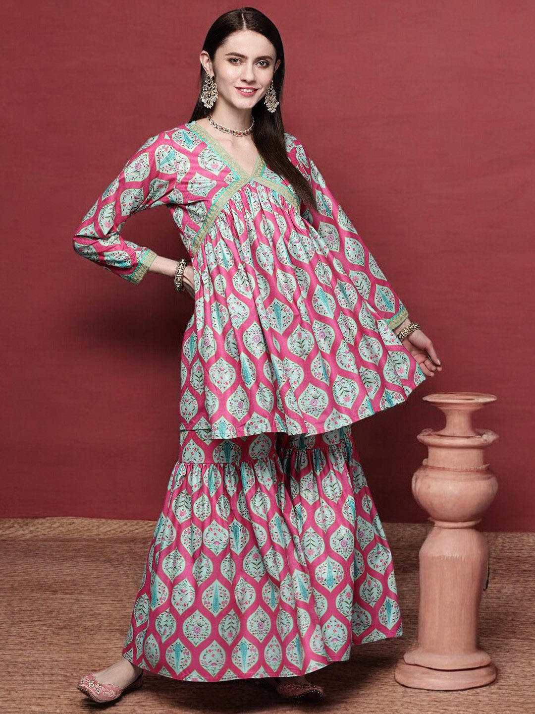 

Ahalyaa Pink Striped Mandarin Collar Velvet A-Line Kurta with Palazzos & Jacket