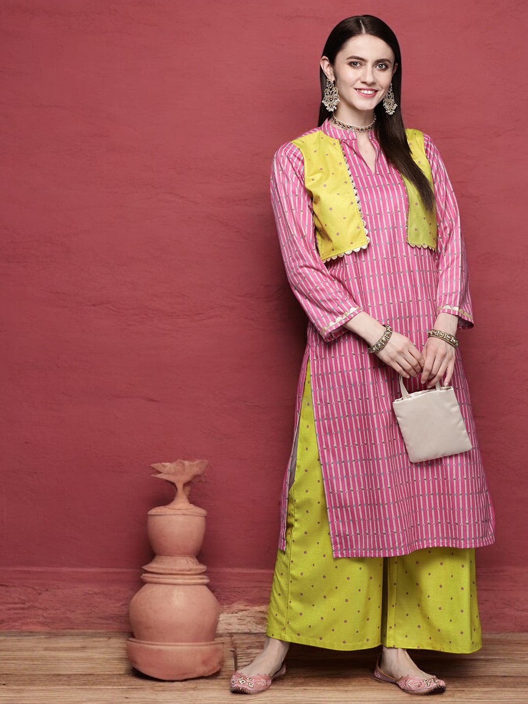 

Ahalyaa Pink Ethnic Motifs Printed Gotta Patti Velvet A-Line Kurta Set