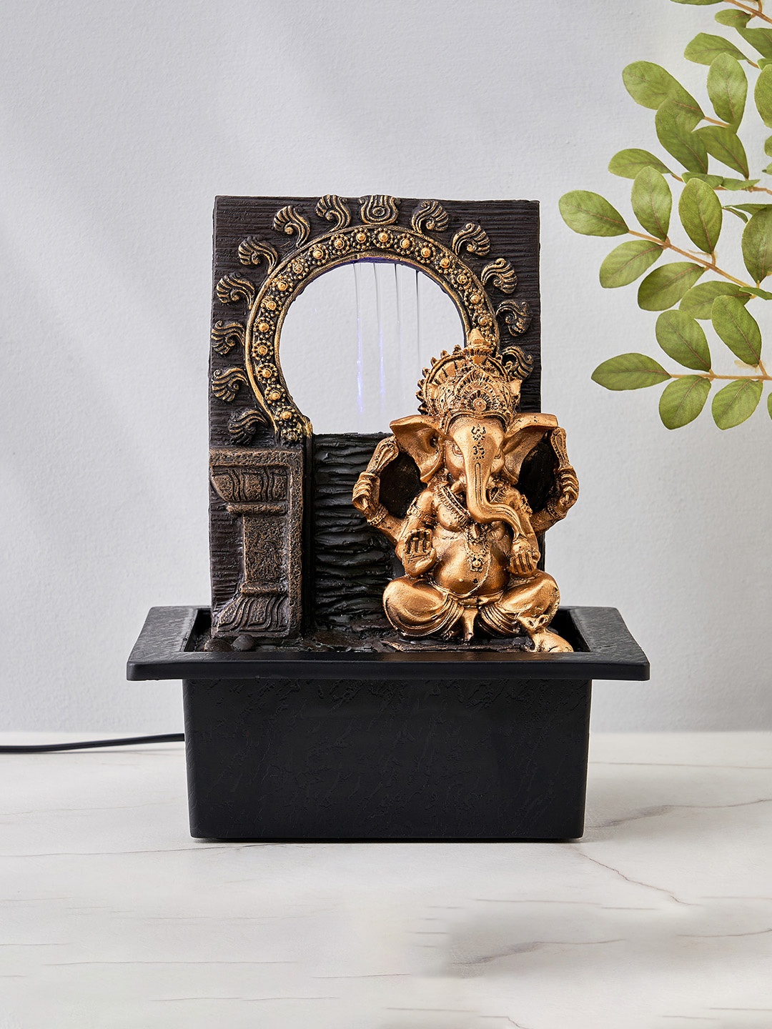 

Home Centre Corsica Alpine Black & Gold-Toned Ganesha Water Fountain