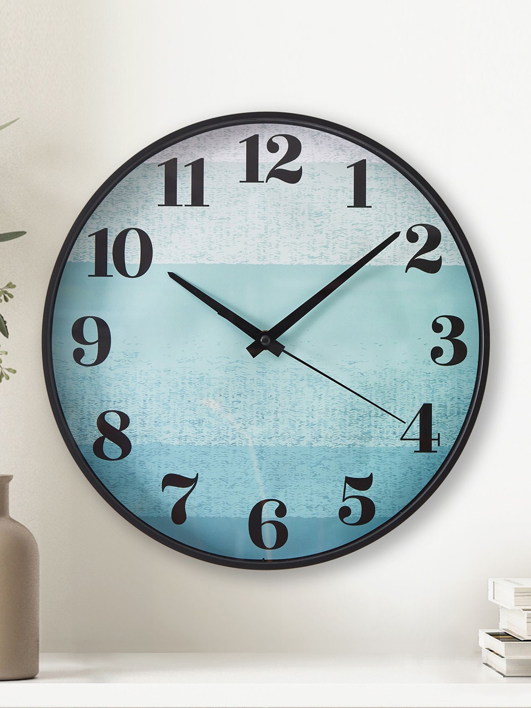 

Home Centre Corsica Casablanca Blue Printed Glass Contemporary Round Shaped Wall Clock