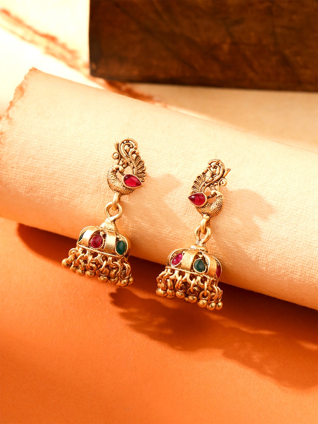 

Yellow Chimes Gold Plated Peacock Shaped Jhumkas Earrings