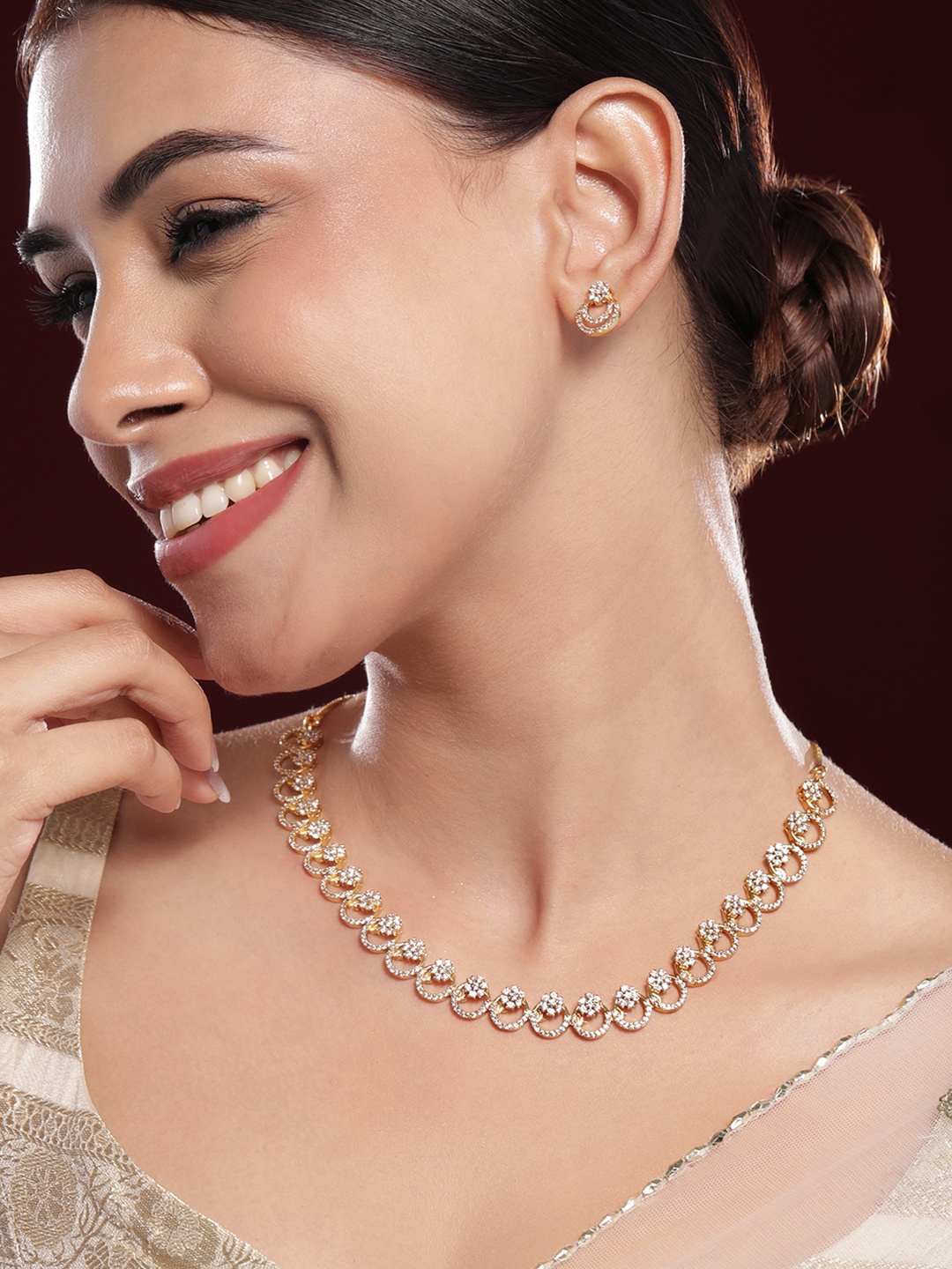 

Rubans 22K Gold-Plated White Cubic Zirconia Studded Elegant Necklace Set with Earrings