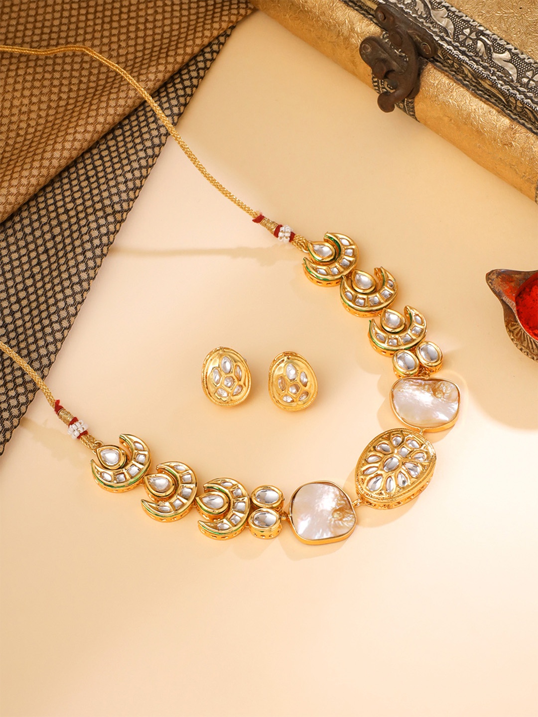 

Yellow Chimes Gold-Plated Kundan Studded & Beaded Necklace and Earrings