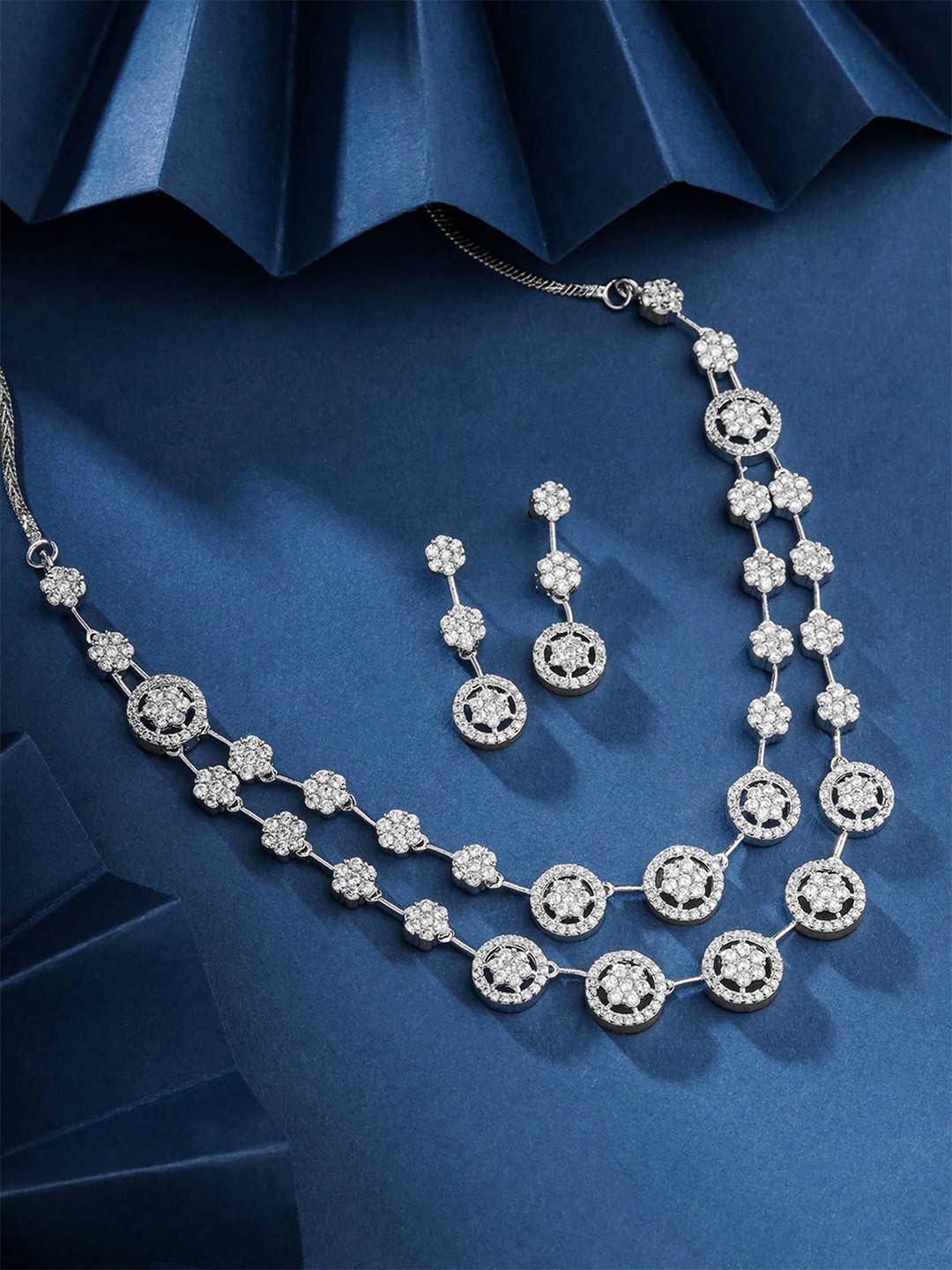 

Yellow Chimes Rhodium-Plated Stone-Studded Necklace and Earrings, Silver