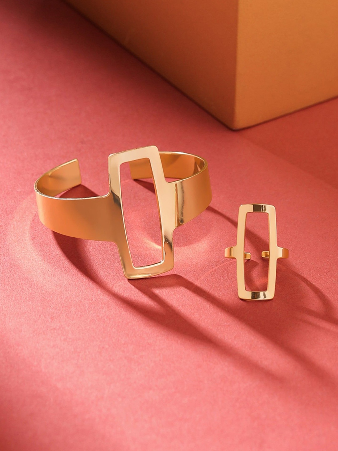 

Yellow Chimes Unisex Gold-Plated Cuff Bracelet & Ring