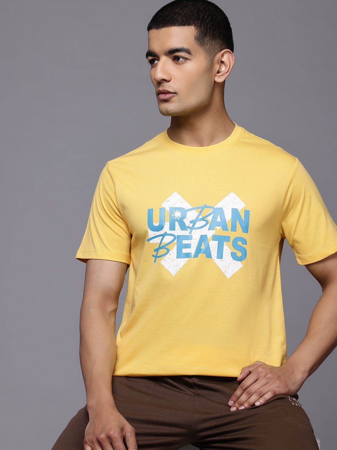 

HRX by Hrithik Roshan Men Typography Printed Lifestyle T-shirt, Yellow