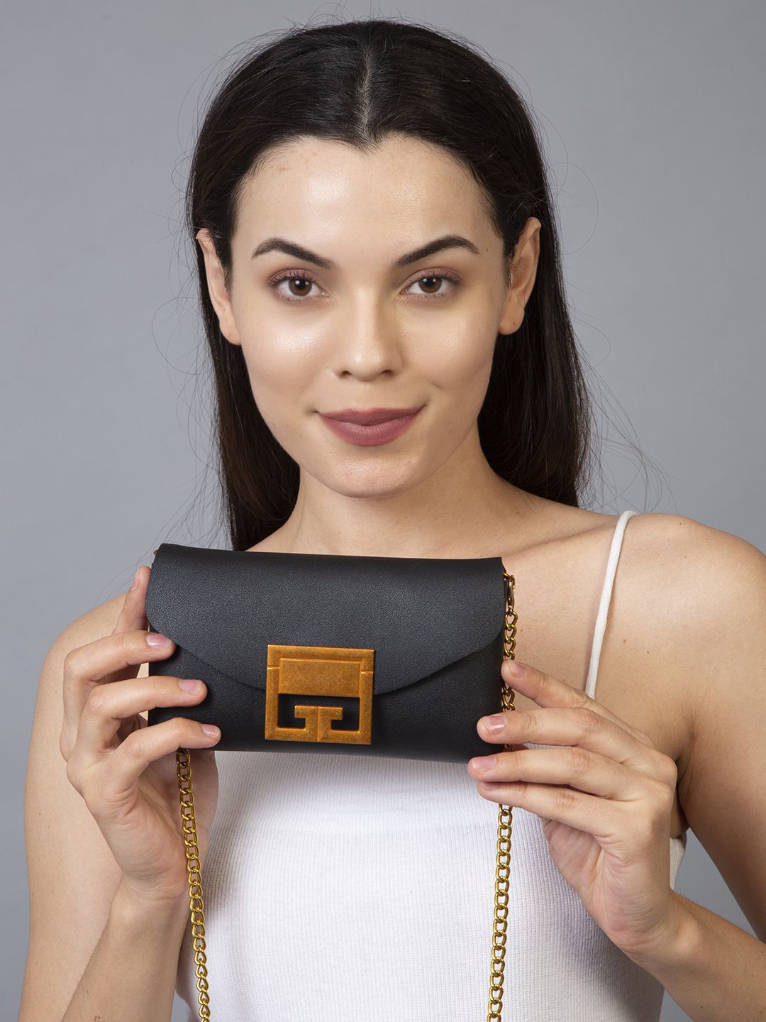 

Filauri Women Textured Leather Sling Bag, Black