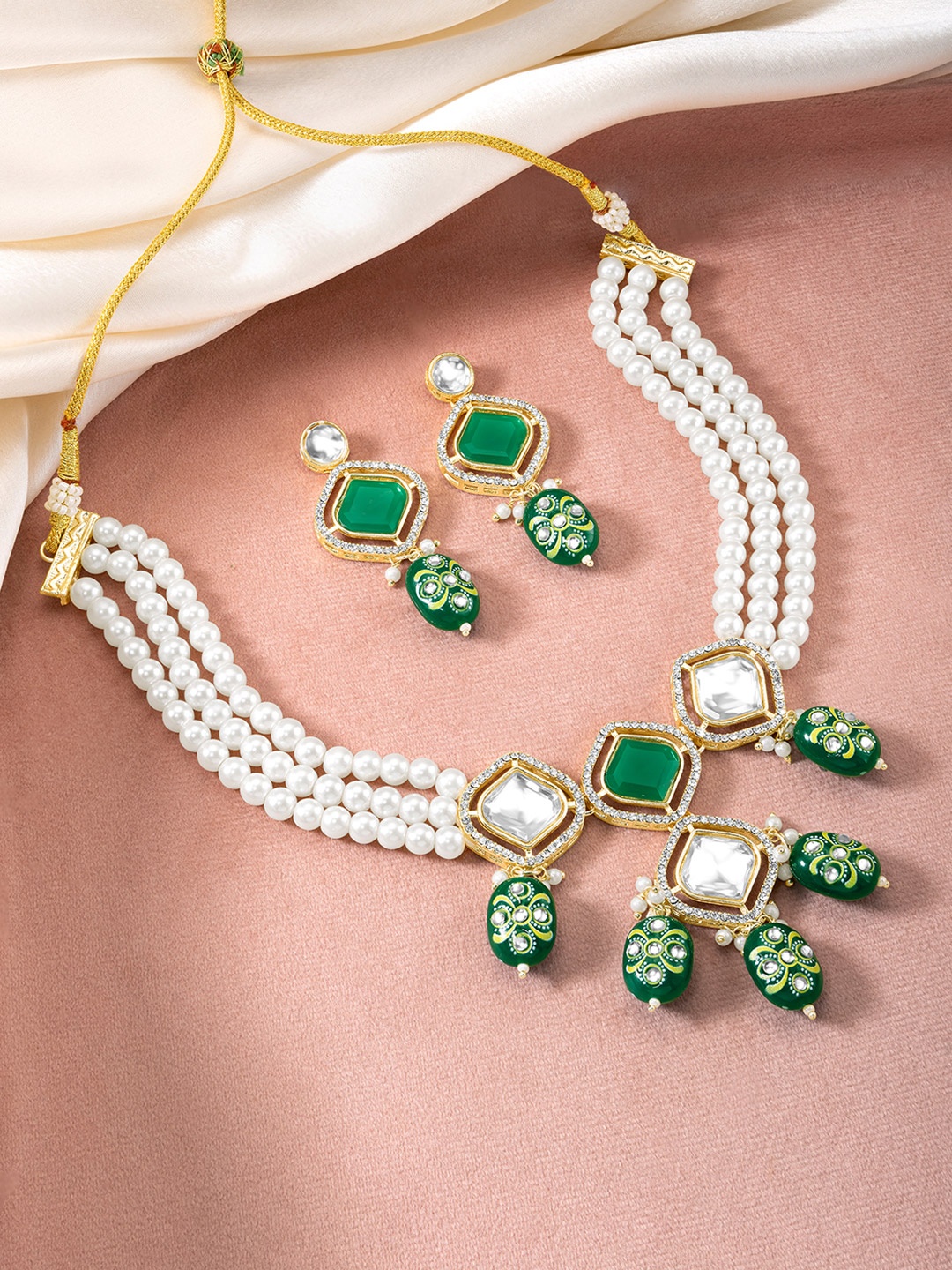 

Peora Gold Plated Cubic Zirconia Stone Studded & Beaded Jewellery Set