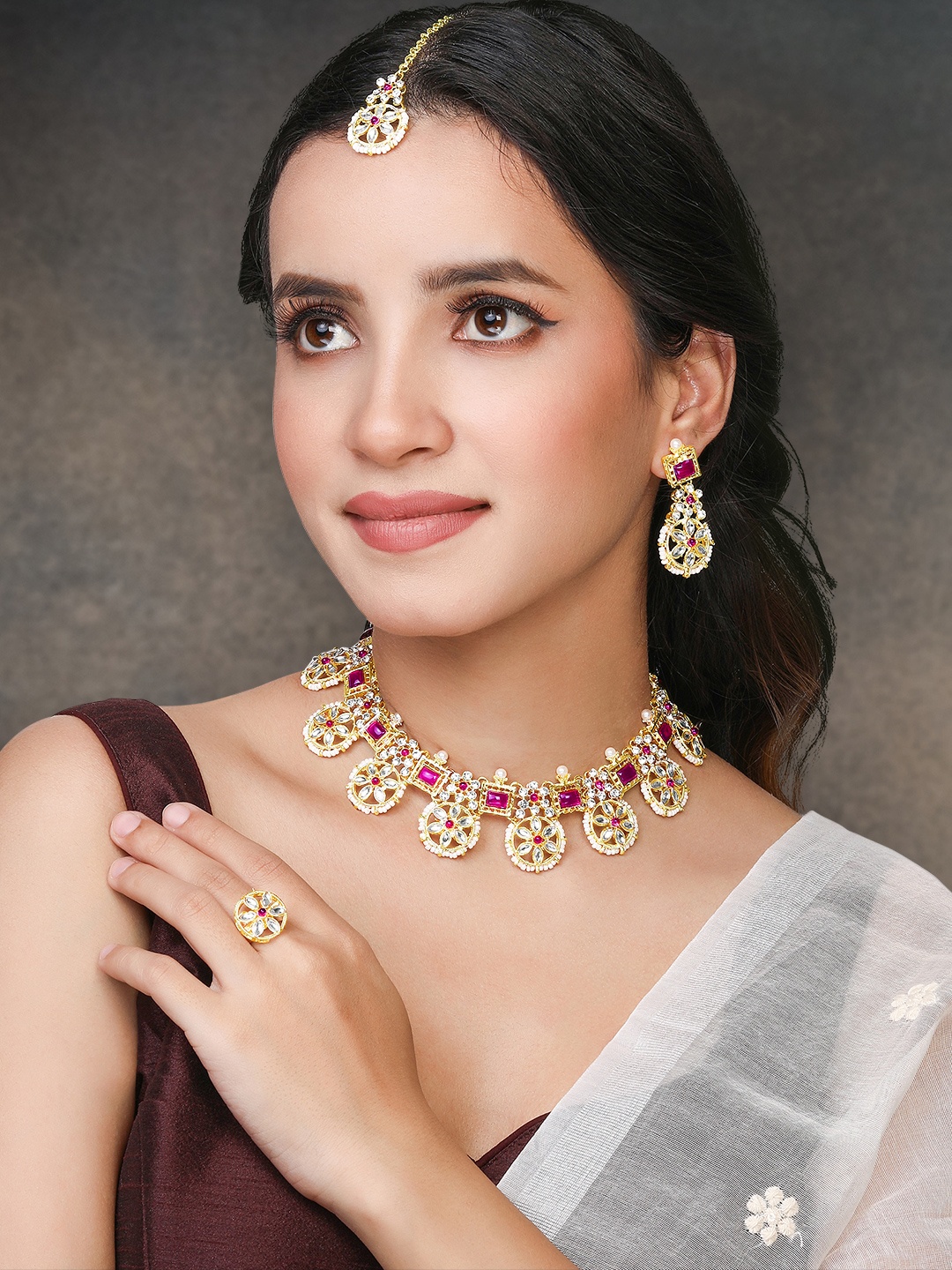 

Peora Gold- Plated Cubic Zirconia Stone Studded & Beaded Jewellery Set