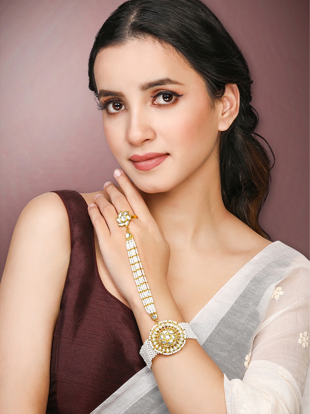 

Peora Gold Plated Kundan Studded & Beaded Haath Panja Haath Phool Bracelet