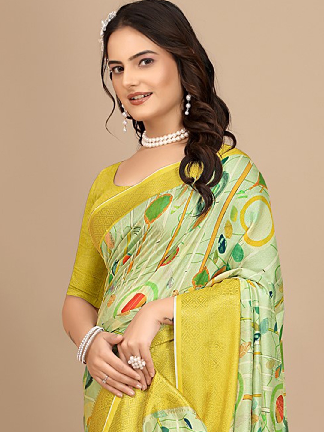 

Pionex Ethnic Motifs Printed Pure Chiffon Saree, Gold